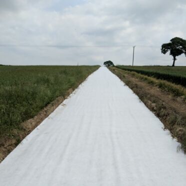 Tejido Geotextil No Tejido de Fibra Cortada de Polipropileno para Separación de Subrasante de Carreteras Temporales