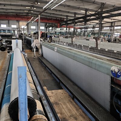 Tejido geotextil tejido industrial diseñado para prevenir la erosión del suelo y el desplazamiento de agregados en aplicaciones de infraestructura