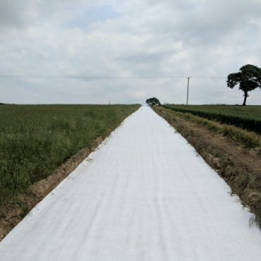 Geotextil no tejido duradero de fibra corta para sistemas de drenaje de subrasante